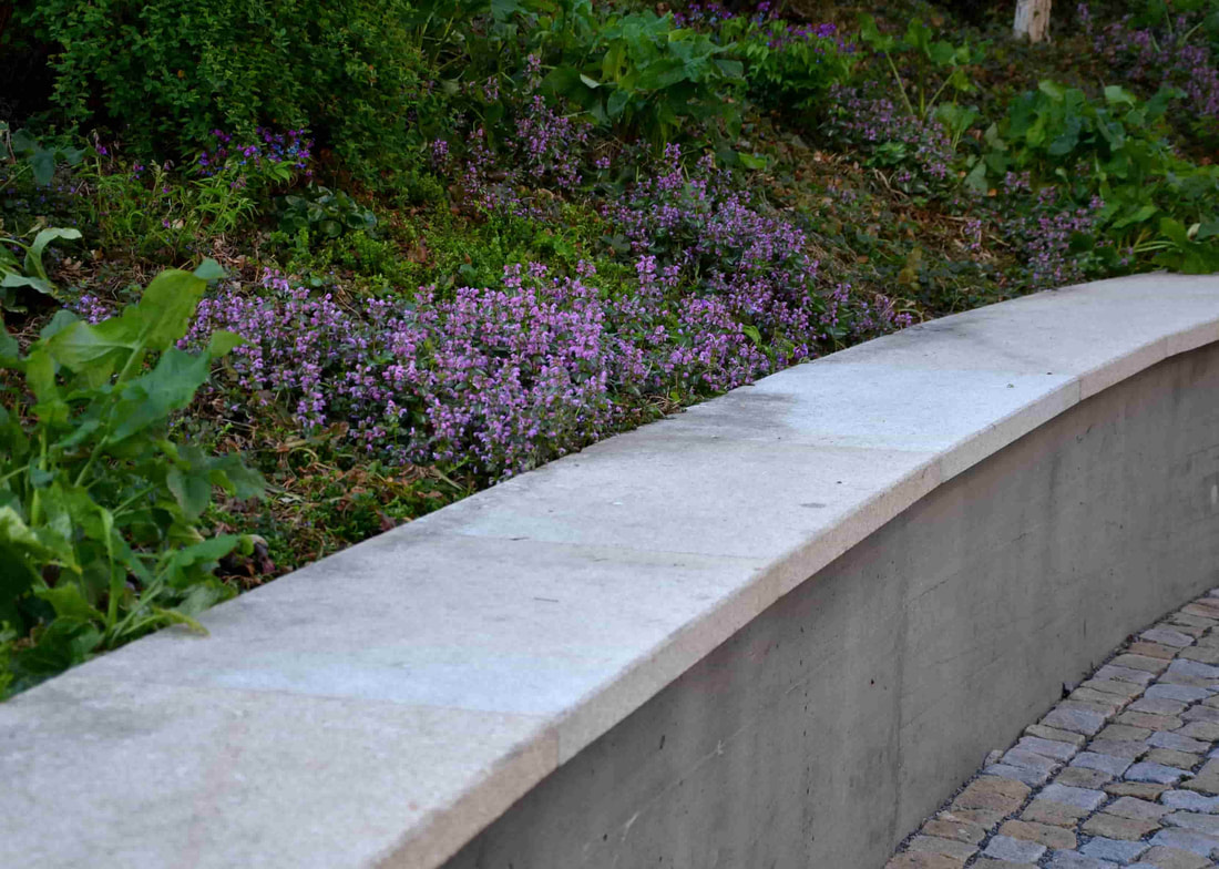 A municipal client of ours requested a retaining wall in a public park to ensure the flowers and plant would stay in place. The installation by our concrete contractors was perfectly done.